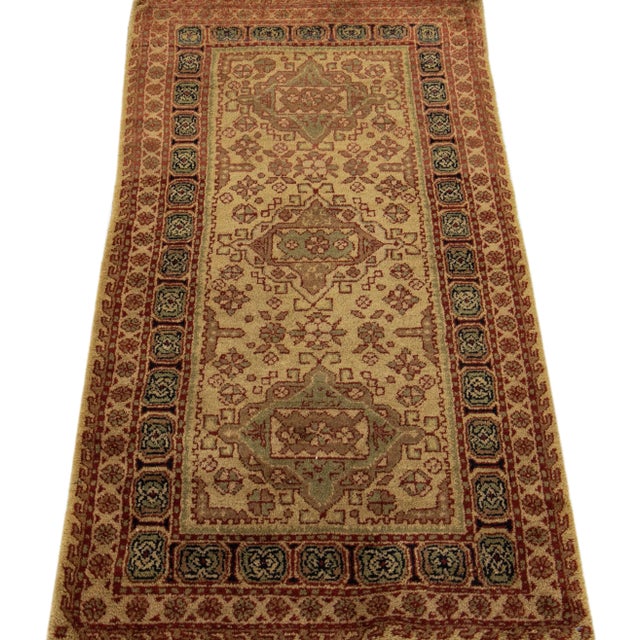 Beautiful modern Tabriz-style hand-knotted wool rug with a tan color field. This piece has rust and green accents, and a...