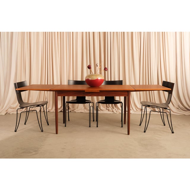 Dyrlund built furniture for people who took their teak seriously, and this table is no exception. Richly grained teak top,...