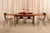 Dyrlund built furniture for people who took their teak seriously, and this table is no exception. Richly grained teak top,...