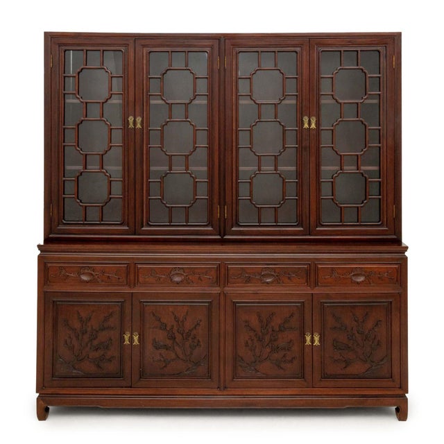 Chinese Rosewood China Cabinet, the top half with four glass paneled doors and carved geometric rosewood design above four...