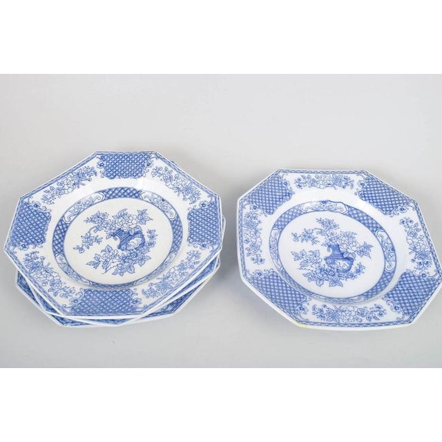 Rörstrand "Hoangho", set of four deep plates. Set of four octagonal deep faience plates from the Hoangho series with blue...