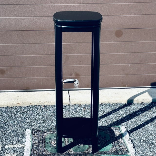 Simple and sturdy plant stand by Lane Furniture of Altavista Virginia on the original black lacquered finish. Blends...