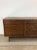 This mid century modern lowboy dresser from Perspective line by Lane Furniture features hardwood construction, walnut...