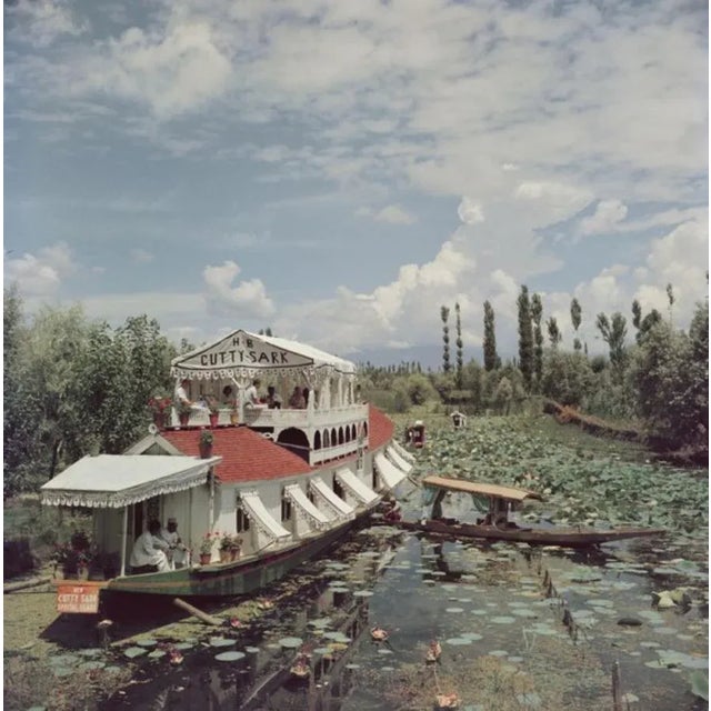 Jhelum River 1961 by Slim Aarons Slim Aarons Limited Estate Edition A luxury boat trip on the Jhelum River near Srinagar,...