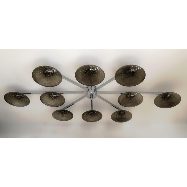 Italian midcentury flush mount with ten smoky Murano glass shades carefully hand blown with bubbles inside the glass using...