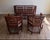 A striking vintage three-piece Brighton Pavilion–style seating set consisting of one settee and two matching armchairs....
