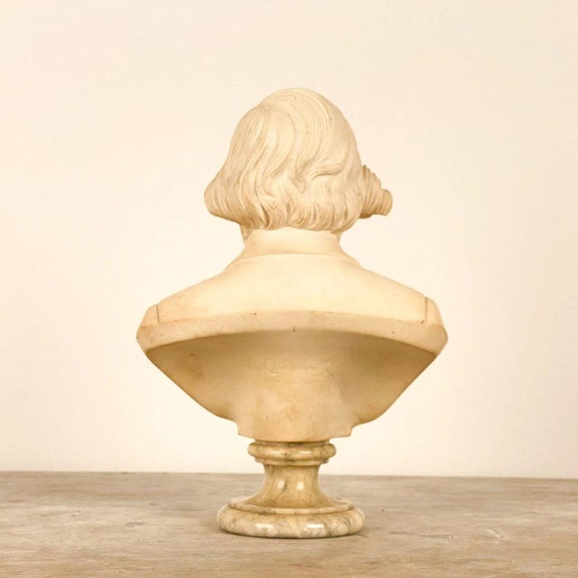 A marble carving of Verdi by A. Giannelli.