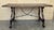 Dining table made of walnut with carved lyre legs and heavy top. The lyre legs are very thick. Beautiful iron stretcher,...