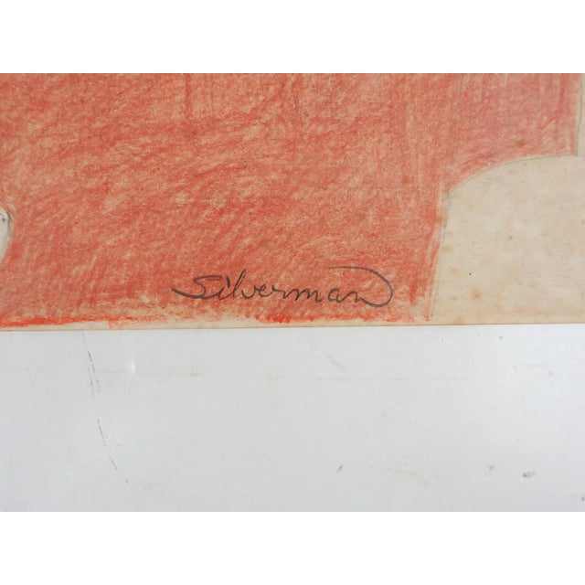 Vintage mid 20th century colored pencil on paper portrait drawing of woman with long dark hair and orange dress. Signed...