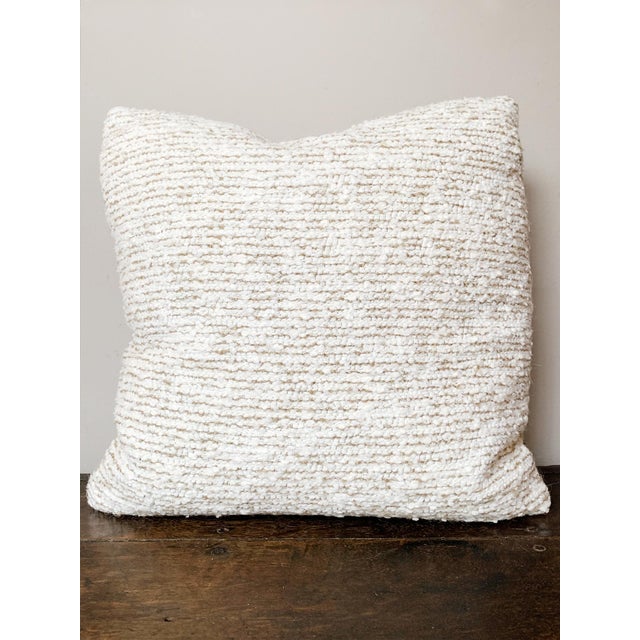 Custom-made exclusively for Cafiero Select, this small pillow has an egg-white bouclé fabric exterior and an interior made...