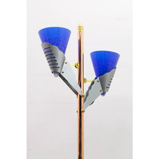 from modernist floor lamp, created by the famous Milanese company Relco. The lamp is made of metal and copper, the two...