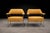 A rare and highly refined pair of Brazilian modern armchairs designed by Joaquim Tenreiro, dating to the 1950s. Conceived...