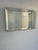 Vintage wall mirror with slight imperfections.(See photos) Includes wire mounting.