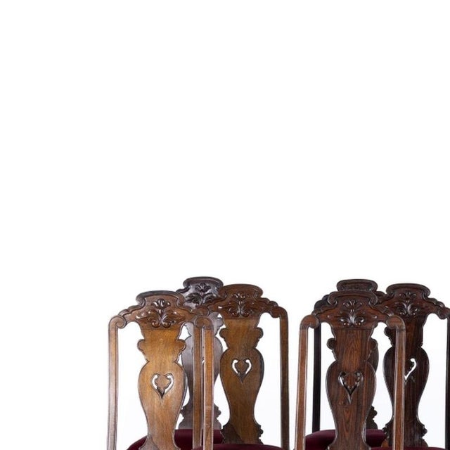 Furniture - Set of twelve Indian chairs - 19th century. India; 19th century; in sissoo wood with carvings. Carved and...