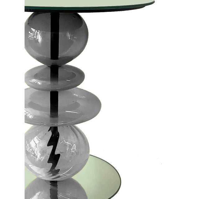 Our Abacus Pieces were intellectually conceived as vertical timelines with each sphere representing a time period or...