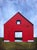 Summer Air by Justin Wheatley | Acrylic on panel Red barn under a blue sky. For Sale