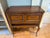 Flip-top charm meets hardworking storage in this elegant cherry wine cabinet bar. Rich warm wood, cabriole legs and...