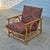 This is a vintage pagoda rattan lounge chair in the style of Ficks Reed. The organic modern style chair has a natural...