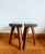 Pair of tripod milking stools, made of solid wood in the Brutalist style, circa 1950. Beautiful lines of gently curved...
