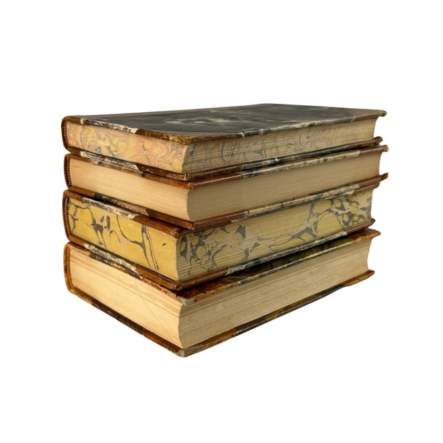Antique Leather‑Bound Book Collection — Set of 4 — Swedish — 1920s–1930s — Marbled Pages A beautifully aged set of four...