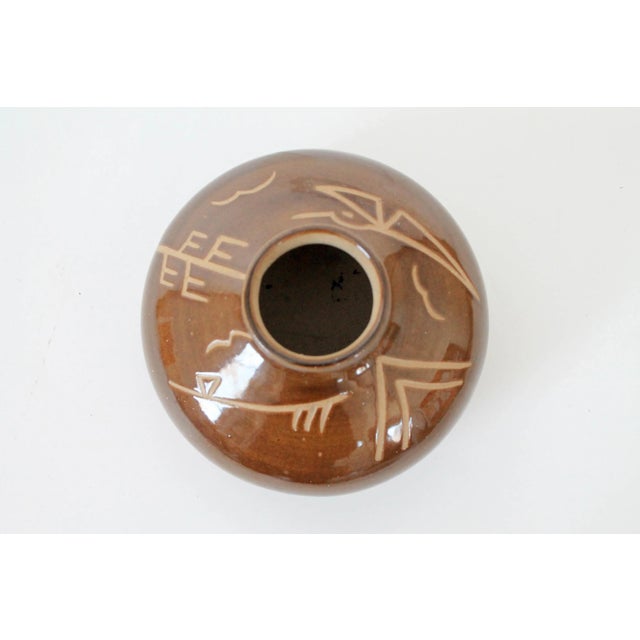 Decorative vintage brown pottery vessel. No makers mark.