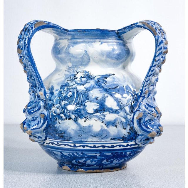 Three-handed majolica vase decorated in blue and white, alba docilia, albissola marina, early 20th century origin...