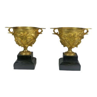 Circa 1830 Pompeii Inspired Decorated Urns of Gilt Bronze-Vine Leaves on Stone Bases- A Pair For Sale
