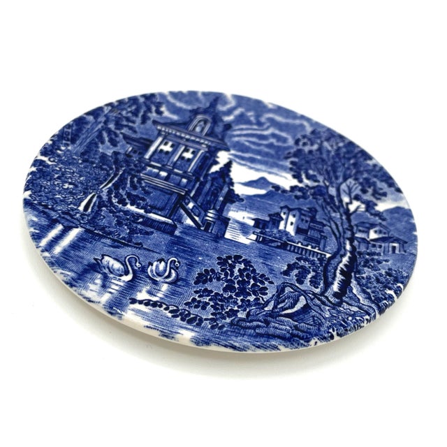 This vintage dinner plate and collectible is limited edition. Hand engraved by English Ironstone Tableware. I put a glass...