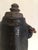 A charming carved wooden storage jar from the middle hills of Nepal. Rich patina lends a great aesthetic and testimony to...