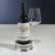 Add a touch of sophistication to your wine service with the Sommelier's Edge Wine Bottle Coaster. Featuring a round...