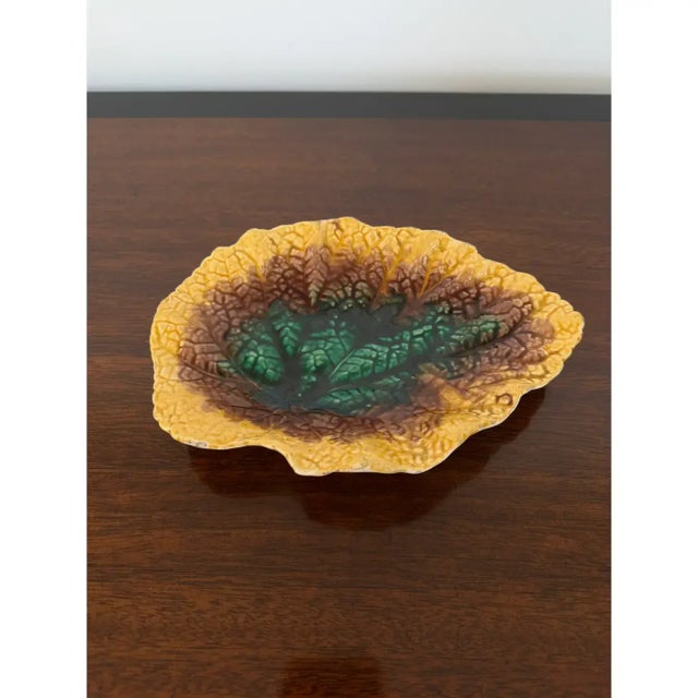This is an exceptional early 19th century signed English majolica plate, it has rich deep unique coloring consisting of...
