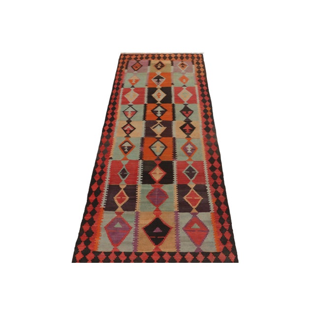 Handwoven in wool, this vintage Kilim is the latest unveiled from R&K Principal Josh Nazmiyal’s coveted treasury of...