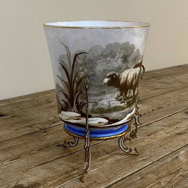 Antique Hand-Painted Opaline Footed Vase will make a delightful addition to your decor, with subtle gray tones in the...