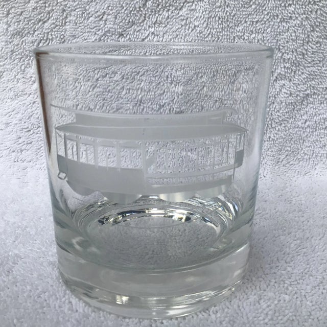 This is a set of 5 lowball Whiskey/Scotch glasses accented with etched trolley cars.