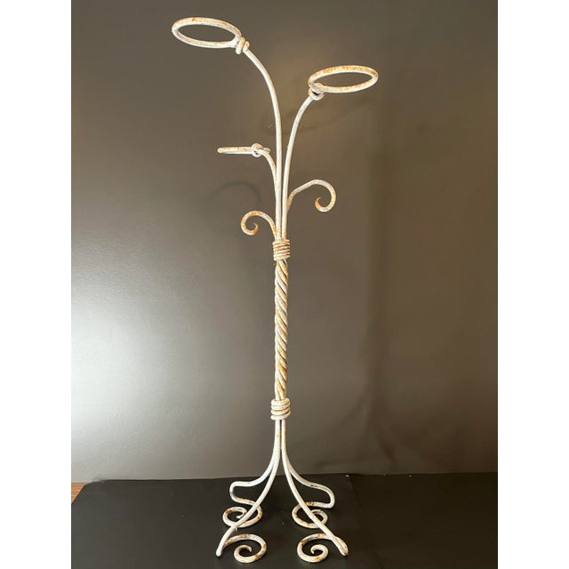 This cast iron, three ring-ring plant stand in a white matte finish is perfect for African violets, herbs, and other...