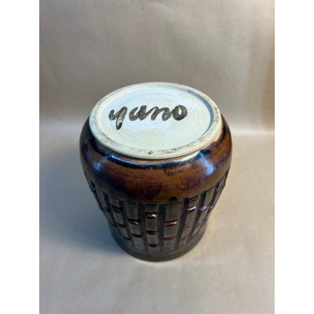 Vintage California Studio Pottery Vase by Yano — Mid-Century Modern Textured Glaze, 1970s A striking hand-thrown studio...