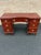 A handsome vintage seven-drawer pedestal writing desk manufactured by American Furniture Co. of Martinsville, Virginia,...