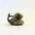 A small mid century ceramic bowl in the shape of a whale. Adorable stylized details. Finished in a gray glaze with a white...