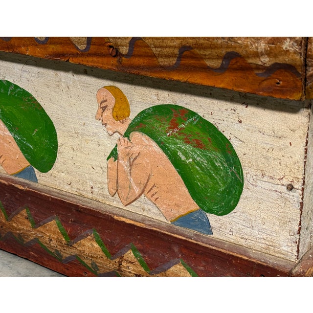 This antique hand painted storage box is an appealing piece of American folk art, decorated on all sides with a repeating...