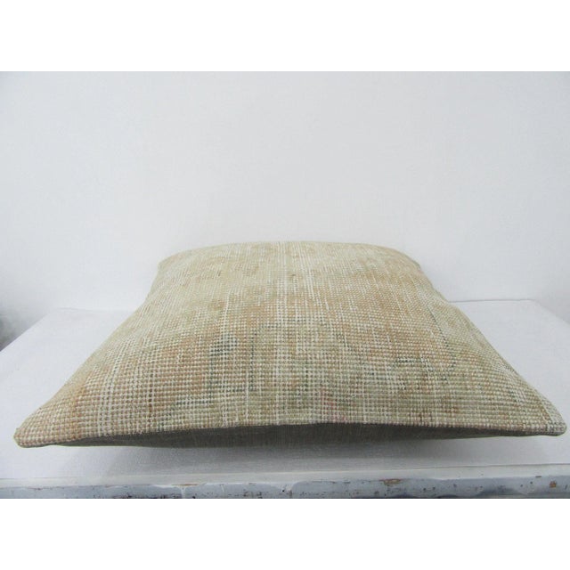 Decorative pillow cover made from a vintage Turkish handknotted rug. Backed with good quality cotton fabric. Pillow...