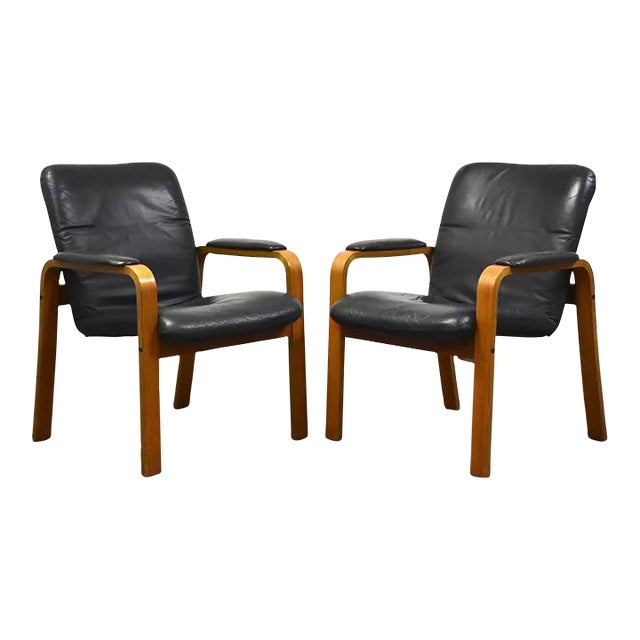 Ekornes Blue Leather and Teak Lounge Chairs - a Pair For Sale