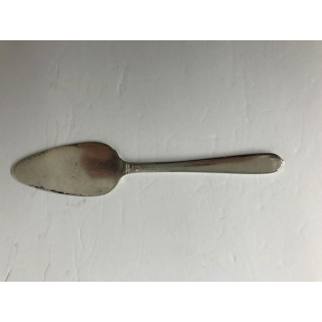 Vintage silver plated cheese server , makers mark reads “ Community “ Very Good condition. 6.75” L X 1.75”W