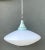 Showcasing retro Space Age design influences, this 1960s pendant light features a broad, saucer-shaped frosted glass...