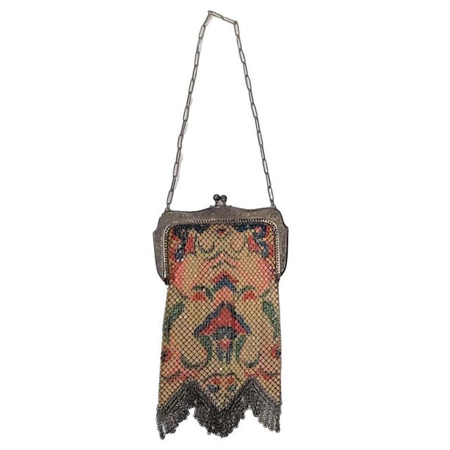 Whiting & Davis 1920's At Deco Flapper mesh purse. It features a kiss-lock clasp, zigzag edge made of very fine chains and...