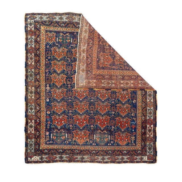 This design is popular on both rugs and bag faces. This SE Persian tribal square scatter show four column, eight row array...