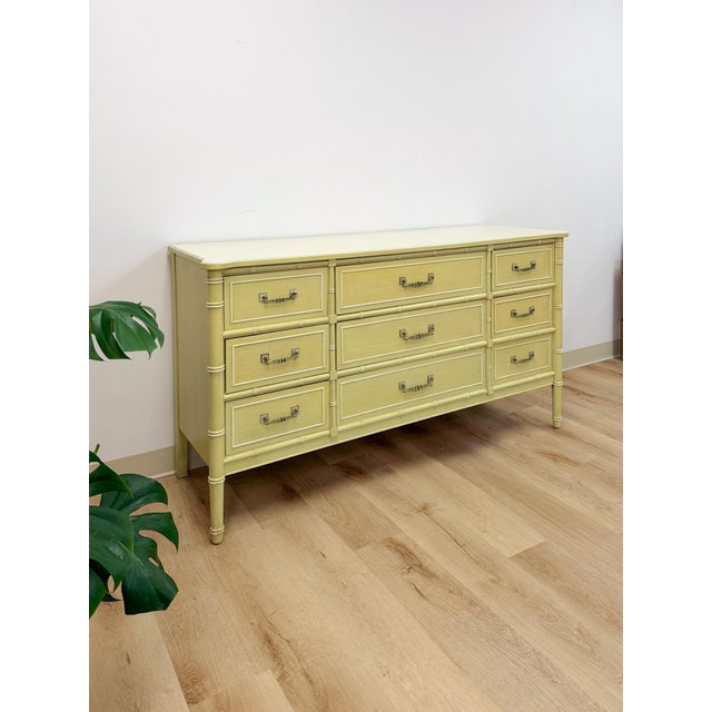 This gorgeous vintage Henry Link "Bali Hai" 9-drawer dresser is a swoon-worthy Hollywood Regency and coastal treasure. The...