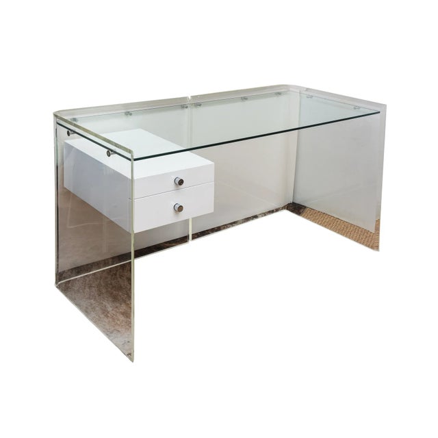 This custom one of kind vintage floating desk is from the 70's. The components are lucite on the outside, steel pegs where...