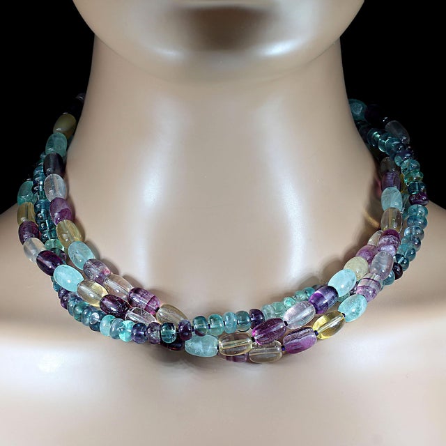 Elegant and contemporary, this 19-inch multi-color fluorite necklace features three beautifully layered strands that...