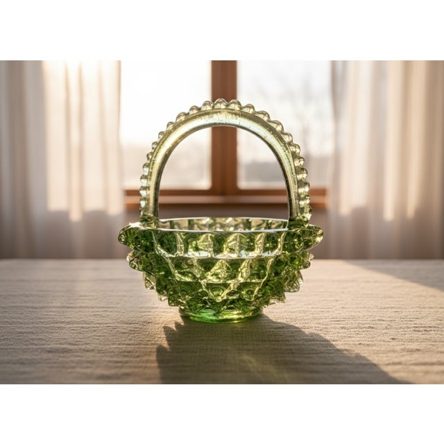 A splendid Murano artistic glass basket, an iconic example of the "Rostrato" technique introduced by renowned designer...