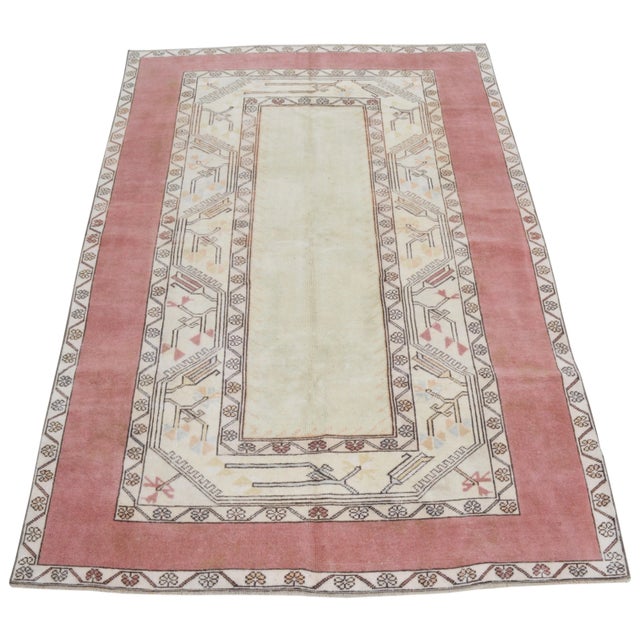 Vintage Turkish Oushak hand knotted rug with natural colors, contemporary style and soft texture.